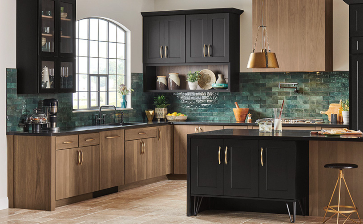 tile backsplash in a kitchen with brown and black cabinetry