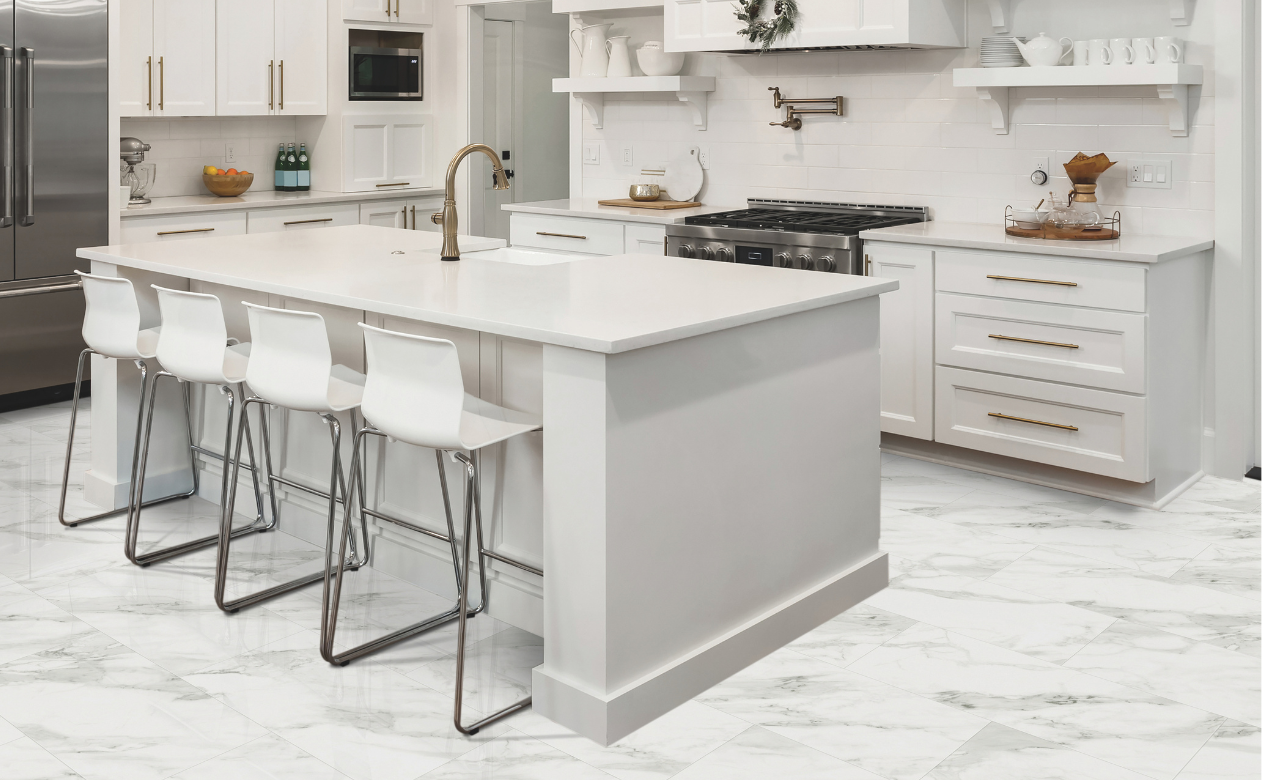 White countertops in a kitchen with white cabinetry