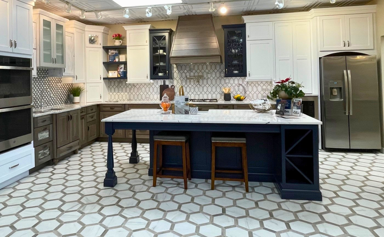 White countertops in a kitchen with white cabinetry