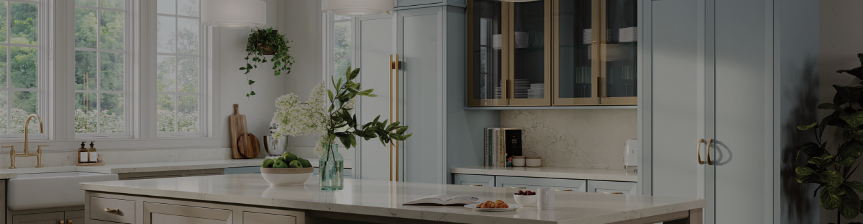 Kitchen with light blue floor to ceiling cabinetry