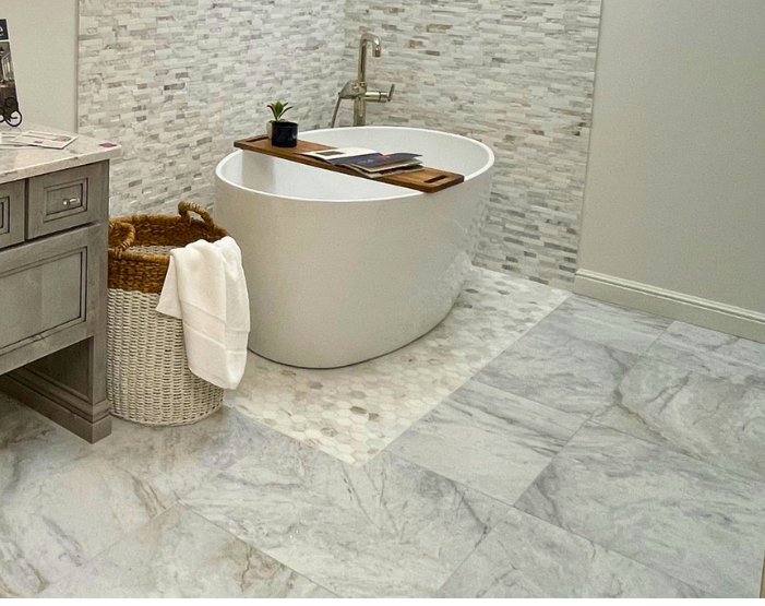 Gray tile flooring in a bathroom display at Kiba in Mentor