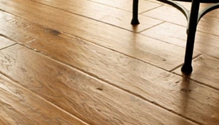Close-up of a rustic hardwood floor with natural texture